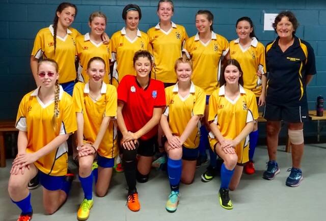 Gaia Malcisi, centre of front row in red shirt, with her 2017 Bellingen High Futsal team mates at the Senior Australasian School Futsal Titles.
Back row - Hannah Watt, Lauren Rigney, Emily Ruming, Katie Thorn, Jordan Healy, Kelsey Williamson, Liz Hoy coach, Front row - Sophie Russell, Willow Neal, Gaia Malcisi, Zali Rees, Sarah Ludwig.
