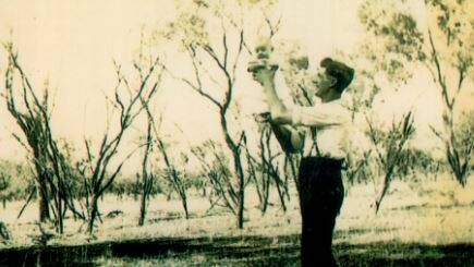 Bernice as a baby with her father surrounded by the Australian bush she was raised in as a child in country NSW. Photo courtesy of Prue Cooper.