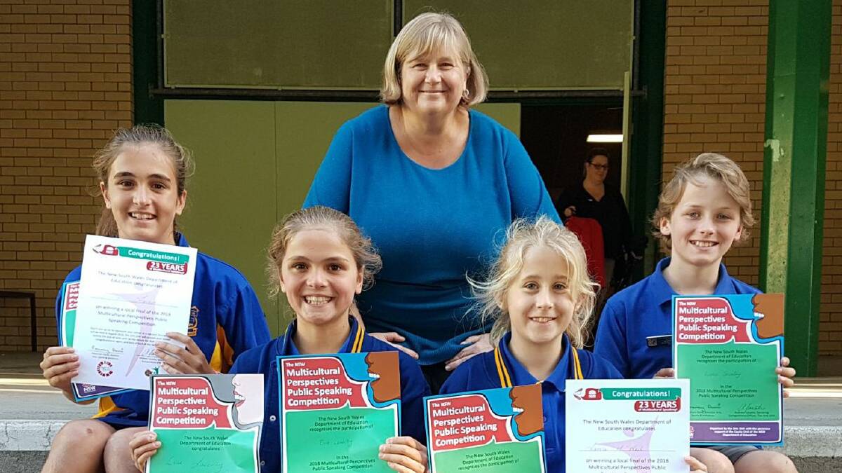 Speaking success: Commended for their Multicultural Perspectives Public Speaking Competition are students from left, Imogen Laverty, Evie Laverty, Laura McNeil and Luka Shirley with teacher Roz Everson at back. 