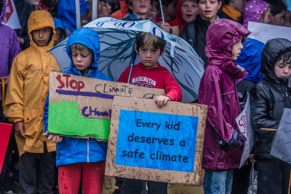 Message to government: Hundreds of Canberra students protested outside Parliament House on Wednesday asking for climate change action. Thousands more, worried about their future, are striking around the country this week. Photo: Karleen Minney