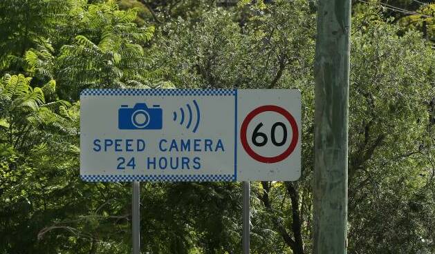 Speed camera warning signs might go