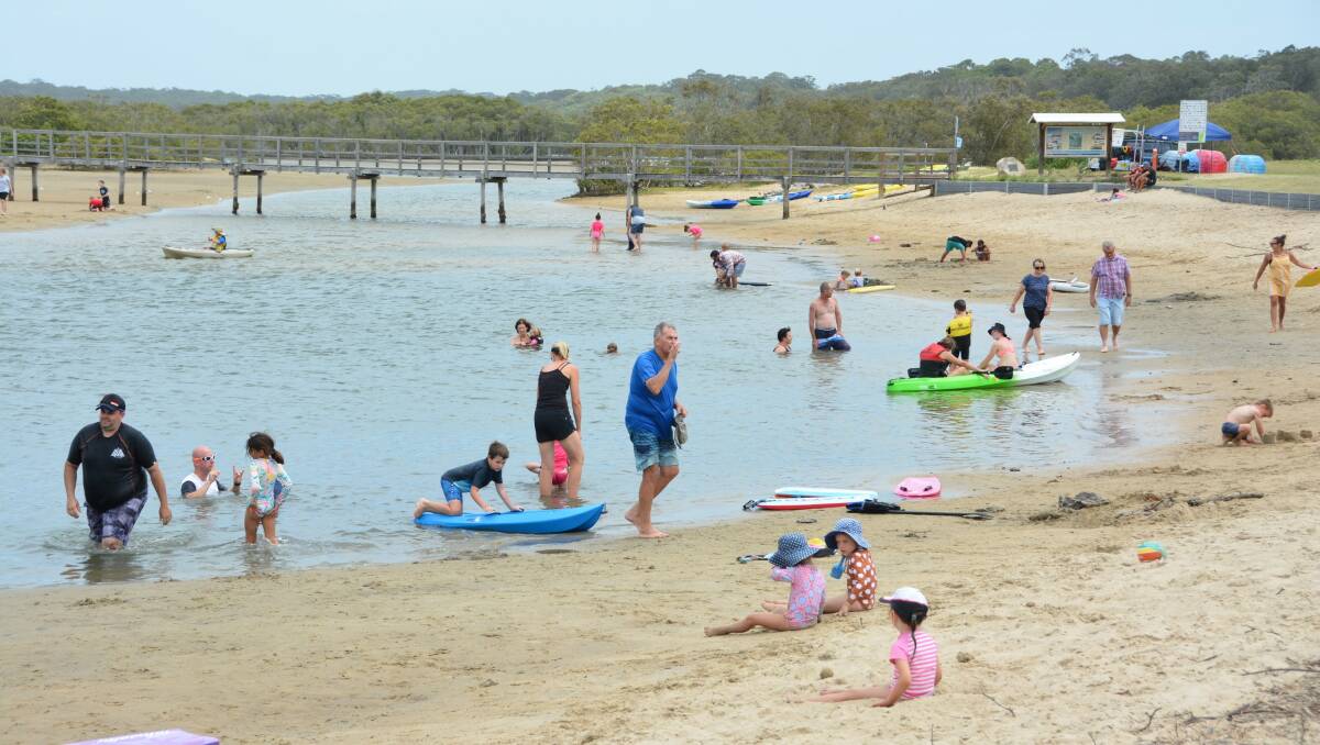 GETTING OUT OF THE CITY: Holiday crowds at Urunga