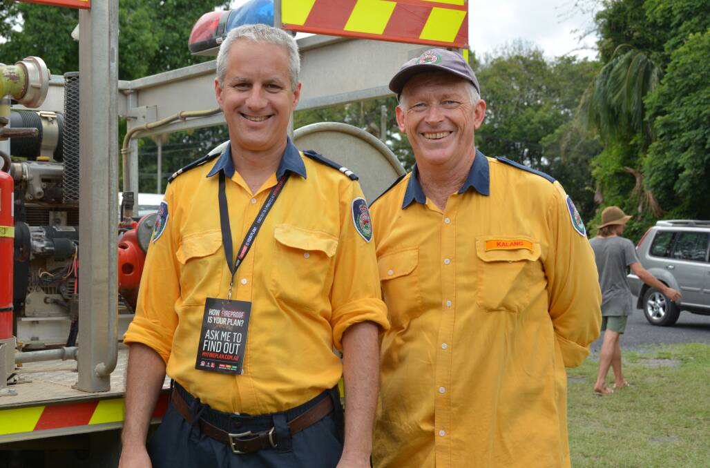 WE THANK YOU ALL: Anton Juodvalkis and Tim Fry were among the RFS volunteers in Bellingen on Saturday