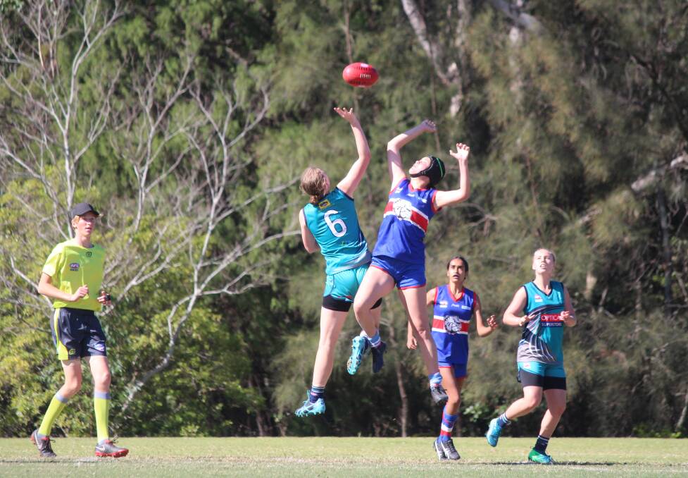 Jamika McAulay leaps for the ball