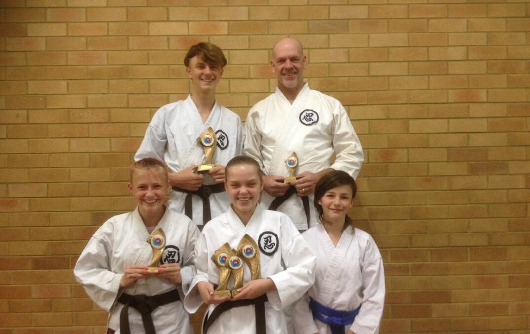 Urunga's karate kids hard won trophies and experience