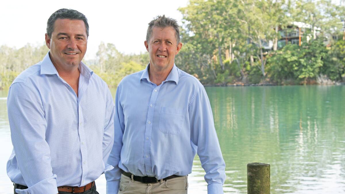 Cowper candidate Pat Conaghan with outgoing Member Luke Hartsuyker on the banks of the Kalang River at Urunga