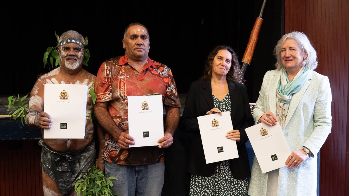 Anaiwan Elder Uncle Les Ahoy, Craig Anderson from the Dunghutti Elders Council, Regional Manager Heritage NSW Cheryl Brown, Professor Brigid Heywood Vice-Chancellor and UNE CEO. Photo: Supplied