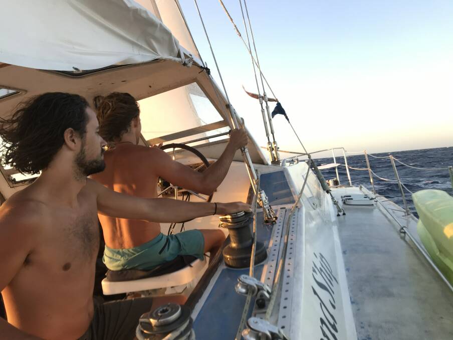 AT SEA: Dudley man Colin Fuge and a crewmate. 
