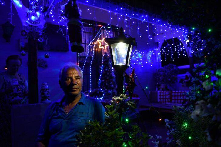 Christmas lights in Second Street Ashbury.
Pictured is Spiros Tzouganatos who has been decorating his house at Christmas for 32 years on Second Street Ashbury for the first time.
13th December 2016.
Photo: Steven Siewert