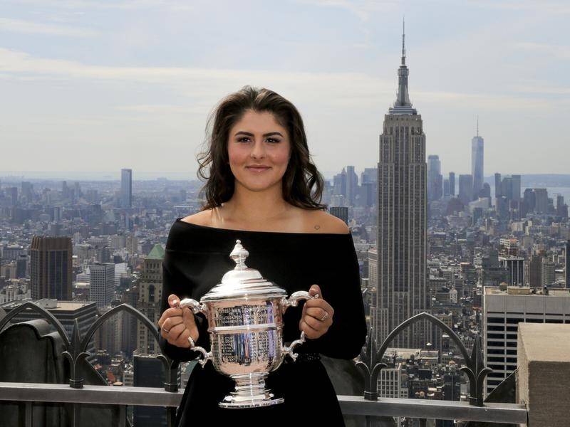Canada's Bianca Andreescu celebrates her US Open win above New York City.