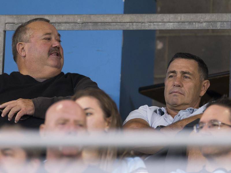 Former Sharks coach Shane Flanagan watched son Kyle play in Cronulla's NRL trial with Manly.
