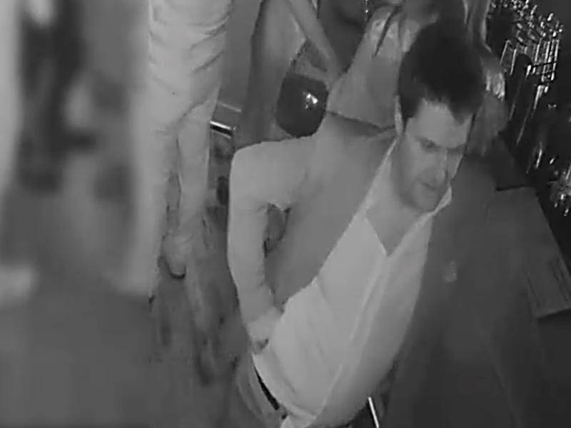 Police want to speak to a man over an alleged assault at a St Kilda bar.
