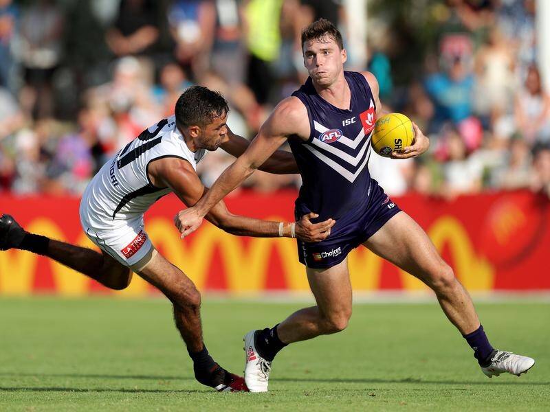 Blake Acres (r) is in line to make his AFL debut for Fremantle against St Kilda on Saturday.