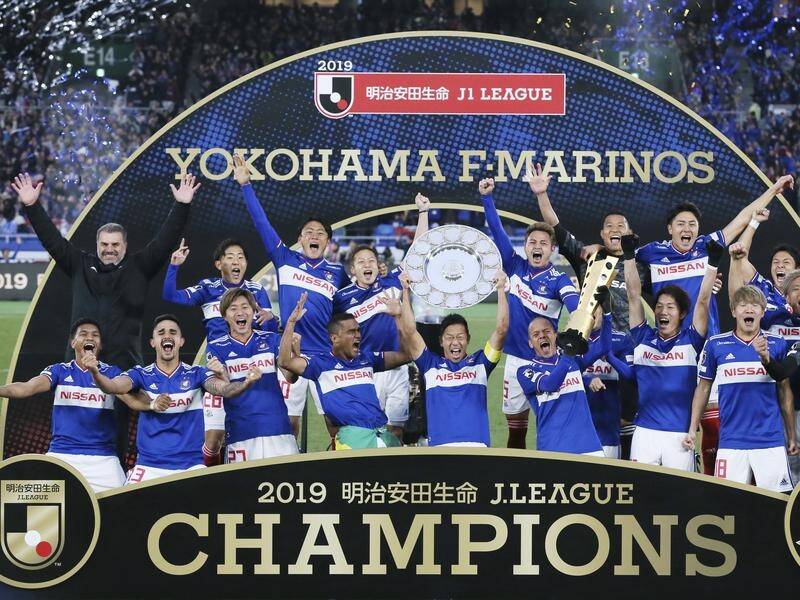 Former Socceroos coach Ange Postecoglou celebrates winning the J-League title with Yokohama.