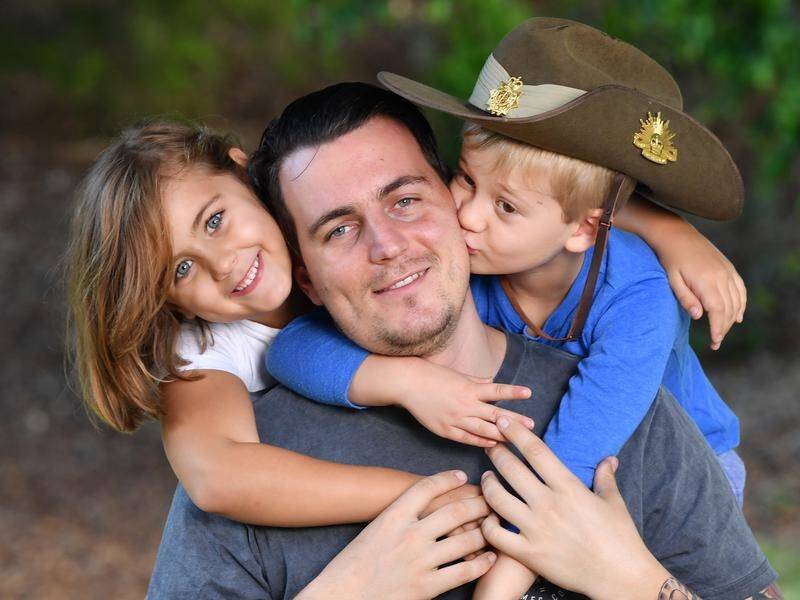 Former ADF medic James DeAngelis will spend Anzac Day with his children Ava, 6, and Harry, 4.