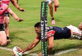 Daniel Tupou scores a try for the Roosters during the defeat by Penrith Panthers. (Mark Evans/AAP PHOTOS)