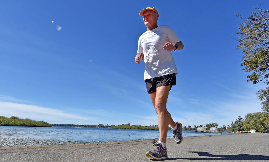 Author, doctor and MS sufferer Professor George Jelinek  takes part in the Overcoming MS Walk at Lake Wendouree on Saturday. Picture: JEREMY BANNISTER